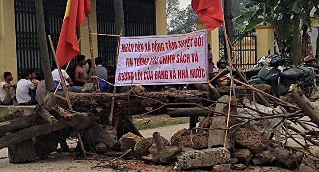 14 cán bộ liên quan đất đai ở Đồng Tâm hầu tòa Ảnh minh họa. Nguồn Sputnick