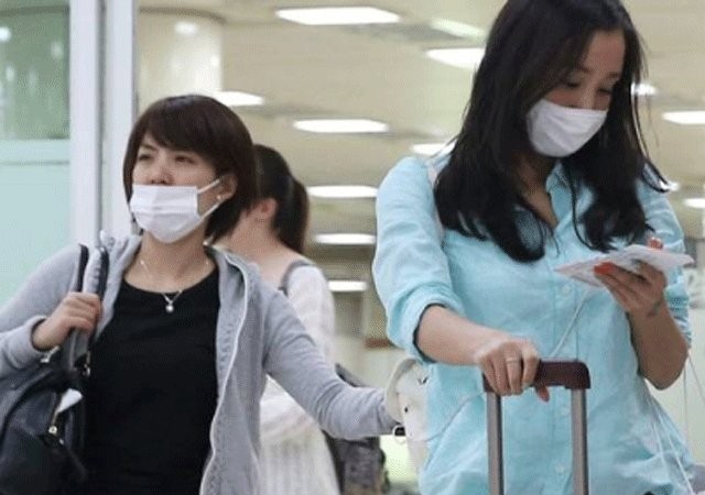 Sợ dịch MERS khách Việt hủy tour đến Hàn Quốc Phụ nữ Hàn Quốc mang khẩu trang chống lây nhiễm virus MERS