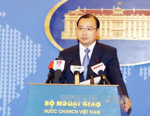 Tàu thăm dò dầu của Trung Quốc đã ra khỏi vùng biển Việt Nam Phát ngôn viên Bộ Ngoại giao Lê Hải Bình phát biểu tại buổi họp báo. Ảnh: Phạm Kiên - TTXVN