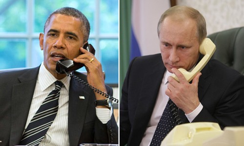 Putin điện đàm trực tiếp với Obama Tổng thống Mỹ Barack Obama (trái) và người đồng cấp Nga Vladimir trong một cuộc điện đàm. Ảnh: Reuters/RIA Novosti.