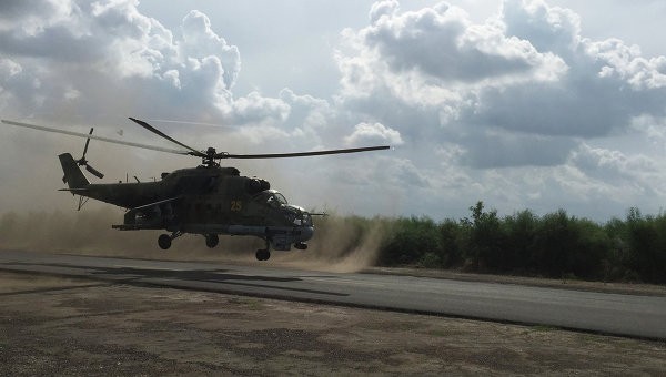 Hoảng loạn, chiến binh IS chạy trốn vào các nhà thờ Hồi giáo Trực thăng Mi-24 Nga trên căn cứ quân sự ở Syria