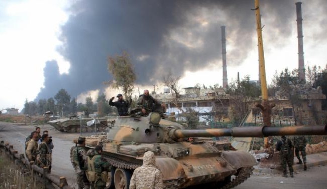 Hồi giáo cực đoan phối hợp với quân đội Syria tấn công IS Hồi giáo cực đoan phối hợp với quân đội Syria tấn công IS