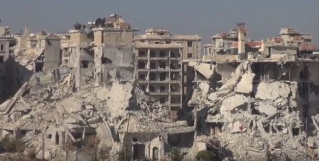 Chùm video chiến sự Syria: Phiến quân đầu hàng hay là chết ở Aleppo Khu phố Jamiyat al-Zahraa, nơi binh sĩ Syria tiêu diệt một nhóm bắn tỉa của lực lượng Hồi giáo cực đoan