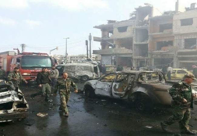 Tướng Syria thiệt mạng, không quân Nga-Syria trút sấm sét báo thù Hiện trường vụ đánh bom tự sát ở thành phố Homs