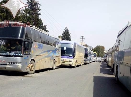 Chính quyền Syria thu hồi 2 thị trấn phiến quân chiếm cứ Đoàn xe di tản chở các chiến binh và gia đình về tỉnh Idlib