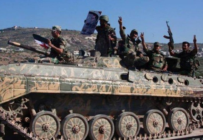 Quân đội Syria nhất loạt tấn công phiến quân trên khắp các chiến trường (video) Binh sĩ quân đội Syria và xe thiết giáp BMP-1 trên chiến trường Hama