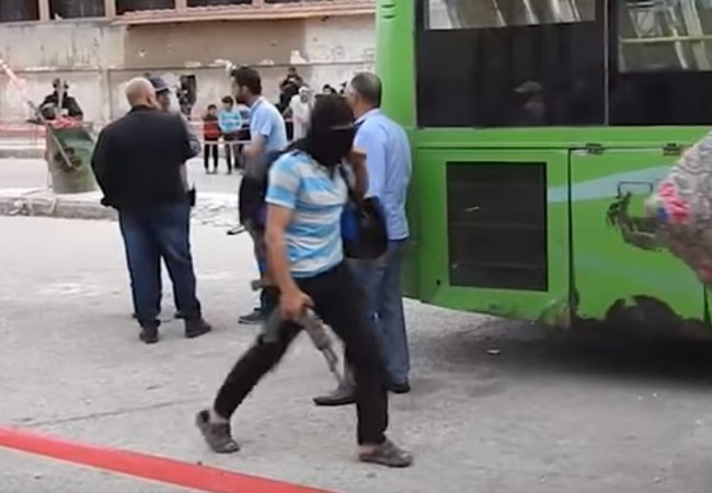 600 phiến quân Syria đầu hàng, giao nộp thành Homs cho chính quyền (video) Lực lượng chiến binh di tản khỏi thành phố Homs