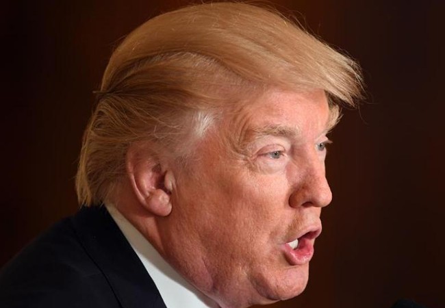Tổng thống Mỹ Donald Trump - “Người mới vào nghề” khó lường Ngày 12/4/2017, tại cuộc họp báo ở thủ đô Washington, Tổng thống Mỹ Donald Trump tuyên bố Chính phủ Mỹ không coi Trung Quốc là nước thao túng tỷ giá hối đoái. Ảnh: Tân Hoa xã/Cankao