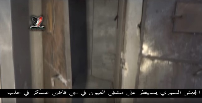 Chiến sự Aleppo: Phiến quân biến bệnh viện thành sở chỉ huy, kho vũ khí và nhà tù (video) - ảnh 18