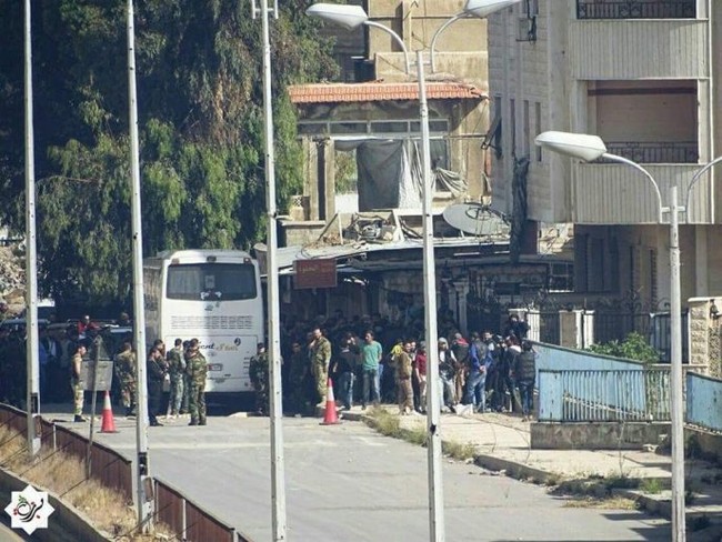 8.000 phiến quân Syria đầu hàng, giao nộp hai quận ngoại ô Damascus - ảnh 7