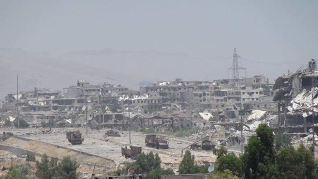 Quân đội Syria trút bão lửa vào hai căn cứ phiến quân ngoại vi Damascus - ảnh 6