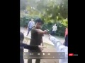 Phó công an xã Tiên Lãnh cầm súng chỉ vào mặt người dân (ảnh cắt từ clip người dân cung cấp)