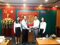 Ông Nguyễn Ngọc Kỳ (người thứ hai từ bên phải sang) được bổ nhiệm Giám đốc Sở Thông tin và Truyền thông Hà Nội - Ảnh: An ninh Thủ đô