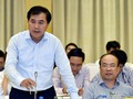 Thứ trưởng Bộ Xây dựng Lê Quang Hùng trả lời báo chí. Ảnh: VGP/Nhật Bắc