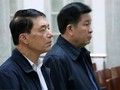 Hai cựu thứ trưởng Tân và Thành trong phiên tòa mở tại TAND Hà Nội. Ảnh/ TTXVN