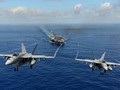 Chiến đấu cơ F/A-18 Super Hornet cất cánh từ tàu sân bay Mỹ.