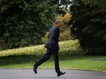 Ông Obama chạy về nhà lấy điện thoại trước khi lên đường đến Chicago