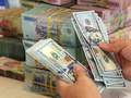 VNDirect: Tỷ giá tăng vừa phải sẽ kích thích xuất khẩu, vốn ngoại khó chảy mạnh ra khỏi Việt Nam