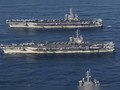 Hai tàu sân bay Mỹ bất ngờ vào Biển Đông tập trận: USS Nimitz (sau và Ronald Reagan (trước) (Ảnh: Dongfang).