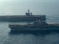 Tàu sân bay USS Theodore Roosevelt và tàu tấn công đổ bộ USS Makin Island của Mỹ đang tập trận trên Biển Đông (Ảnh: Đa Chiều).