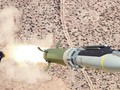 Hình ảnh “bom đường kính nhỏ phóng từ mặt đất” GLSDB rời bệ phóng HIMARS (Ảnh: Sohu).