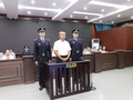 Lý Kiến Bình nghe tuyên án tại phiên tòa phúc thẩm (Ảnh: Thecover).