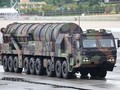 Xe chở kiêm bệ phóng tên lửa Huynmoo-VND. Ảnh: Yonhap.