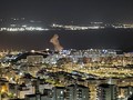 Khói bốc lên từ cảng Eilat ở cực nam Israel ngày 25/9 (Ảnh: Times of Israel)