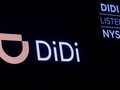 Màn hình hiển thị thông tin giao dịch của tập đoàn dịch vụ gọi xe công nghệ Didi Global trên sàn Sở giao dịch chứng khoán New York tại Thành phố New York, Mỹ, ngày 3/12/ 2021. Ảnh Reuters