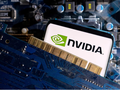 Logo NVIDIA được đặt trên bo mạch chủ máy tính (Ảnh: Reuters)