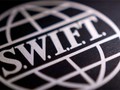 SWIFT đang nỗ lực cải tổ dựa trên blockchain. Ảnh: Reuters.