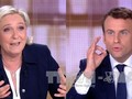 Ứng cử viên độc lập Emmanuel Macron (phải) và đối thủ Marine Le Pen. Ảnh: AFP/TTXVN
