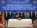 Ông Lê Trung Chinh - Chủ tịch UBND TP Đà Nẵng và ông Trương Gia Bình - Chủ tịch Công ty CP FPT tại lễ ký kết