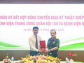 TS.BS Lê Đức Nhân (bìa trái), Giám đốc Bệnh viện Đà Nẵng và Thiếu tướng GS.TS Lê Hữu Song, Giám đốc Bệnh viện TƯ Quân đội 108 tại buổi ký kết.
