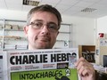 Tổng biên tập  tờ Charlie Hebdo, ông Stephane Charbonnier - Ảnh: AP