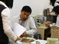 Sau khi tỷ giá được điều chỉnh, điều gì sẽ xảy đến với lãi suất tiền đồng, dự trữ ngoại hối và cán cân thương mại?