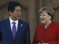 Thủ tướng Nhật Bản Abe và người đồng nhiệm Đức Angela Merkel