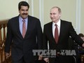 Ngày 15/1, tại Moskva, Tổng thống Nga Vladimir Putin (phải) đã có cuộc hội đàm với Tổng thống Venezuela Nicolas Maduro, thảo luận về tình hình thị trường dầu mỏ thế giới. Ảnh: AFP/TTXVN