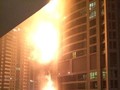 Ảnh lửa bao trùm tòa chung cư cao nhất thế giới