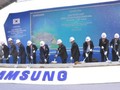 Các đại biểu thực hiện nghi thức khởi công khu phức hợp điện tử gia dụng Samsung tại Khu Công nghệ cao, Quận 9, TPHCM. Nguồn: hochiminhcity.gov.vn.