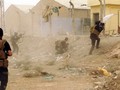 Lực lượng an ninh Iraq chống đỡ không nổi trước các đợt tấn công của IS, dù nhận được hỗ trợ từ bom đạn liên quân 