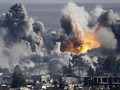 Thị trấn Kobani của Syria ngập trong lửa đạn - Ảnh: Reuters
