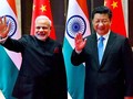 Thủ tướng Ấn Độ Narendra Modi (trái) và Chủ tịch Trung Quốc Tập Cận Bình (phải) trong một cuộc hội đàm tại thành phố Tây An. (Ảnh: PTI)