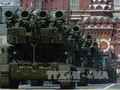 Hệ thống tên lửa đất đối không Buk-M2 của quân đội Nga tham gia duyệt binh. Ảnh: AFP/TTXVN