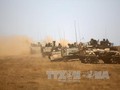 Binh sĩ Israel tham gia cuộc tập trận ở khu vực Cao nguyên Golan. Ảnh: AFP/TTXVN