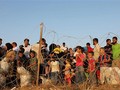 Người tị nạn Syria tại biên giới với Thổ Nhĩ Kỳ ở Hatay. Ảnh: EPA