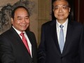 Phó Thủ tướng Nguyễn Xuân Phúc và Thủ tướng Trung Quốc Lý Khắc Cường
