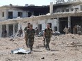 Binh sĩ quân đội Syria trong những khu phố vừa giải phóng