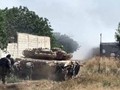 Binh sĩ quân đội Syria cùng xe tăng tấn công trên vùng Đông Ghouta