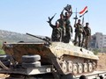 Binh sĩ quân đội Syria trên chiến trường miền Bắc tỉnh Hama